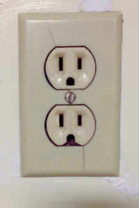 Broken loose electrical outlet