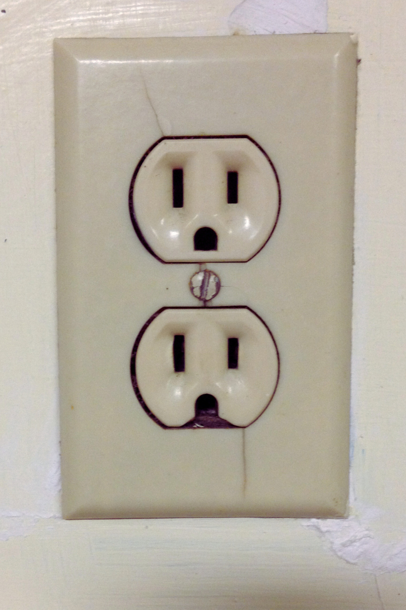 Broken loose electrical outlet 